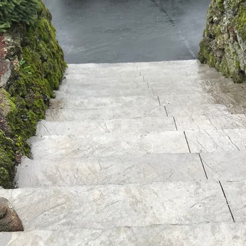 View from the top down of new, stamped concrete steps