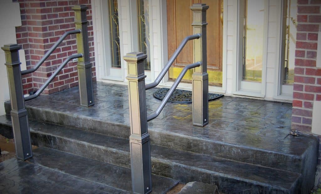 Handrails on stamped concrete steps