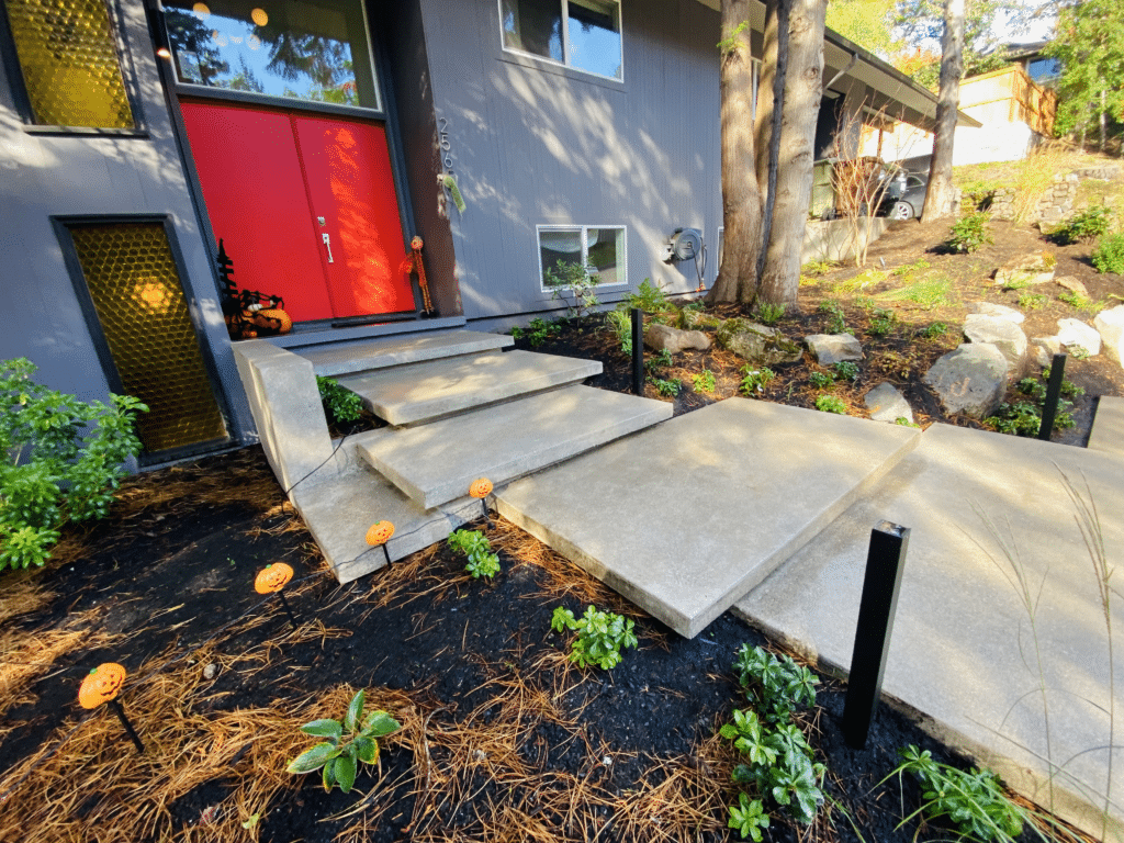 Floating steps lead up to a custom home in Portland, Oregon