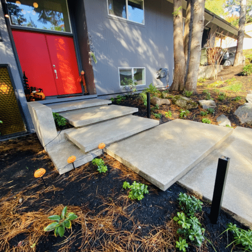 Floating steps lead up to a custom home in Portland, Oregon