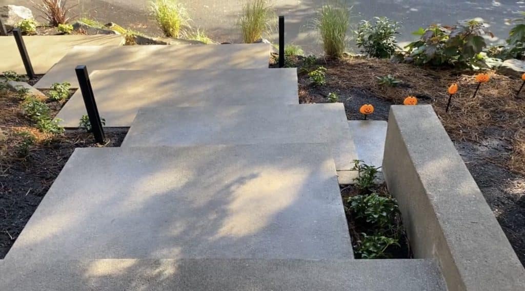 Top view of floating concrete steps out front of a Portland home