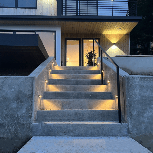 Retaining walls with lighted steps